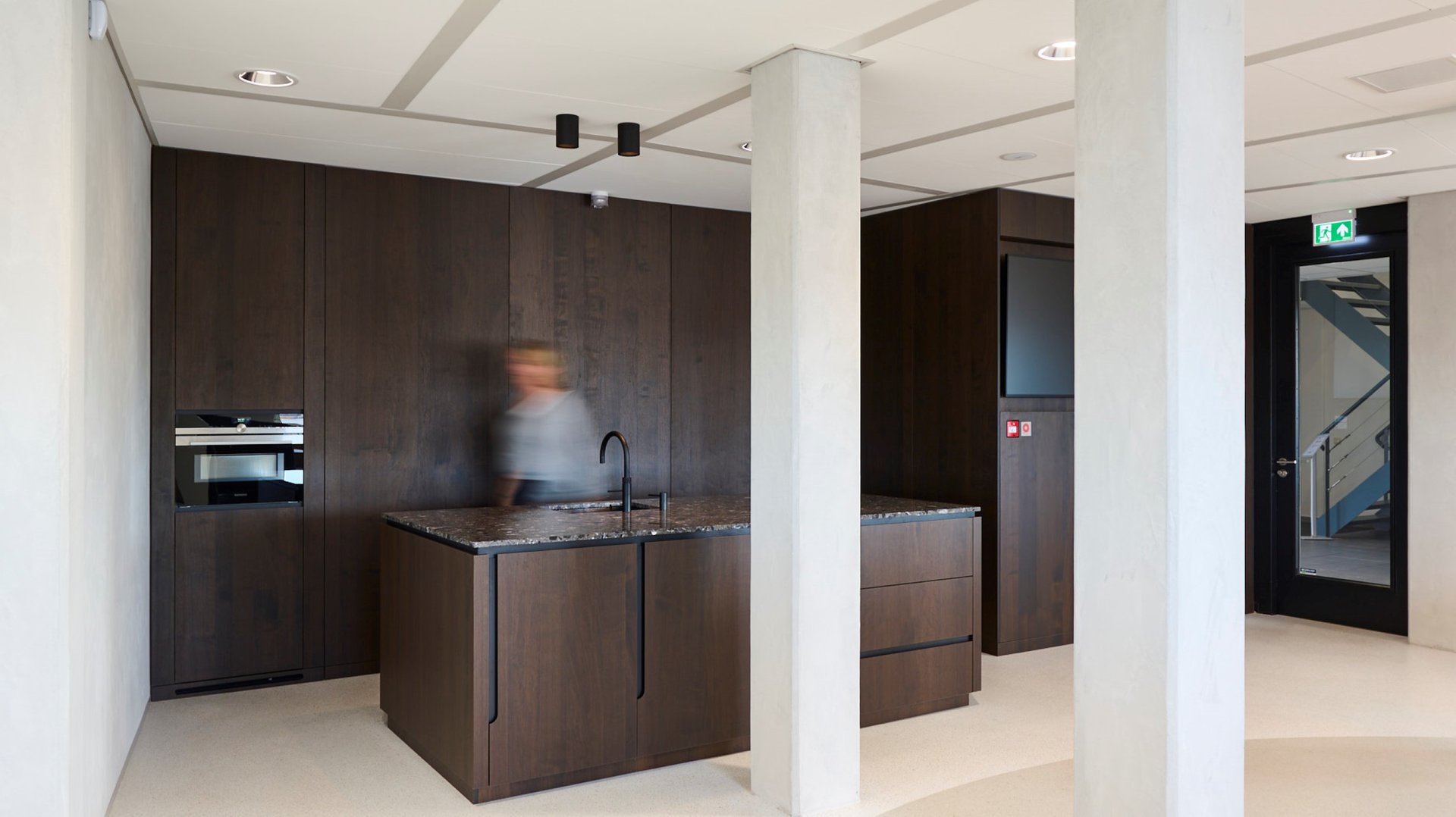 Interior with curved lines and natural materials.