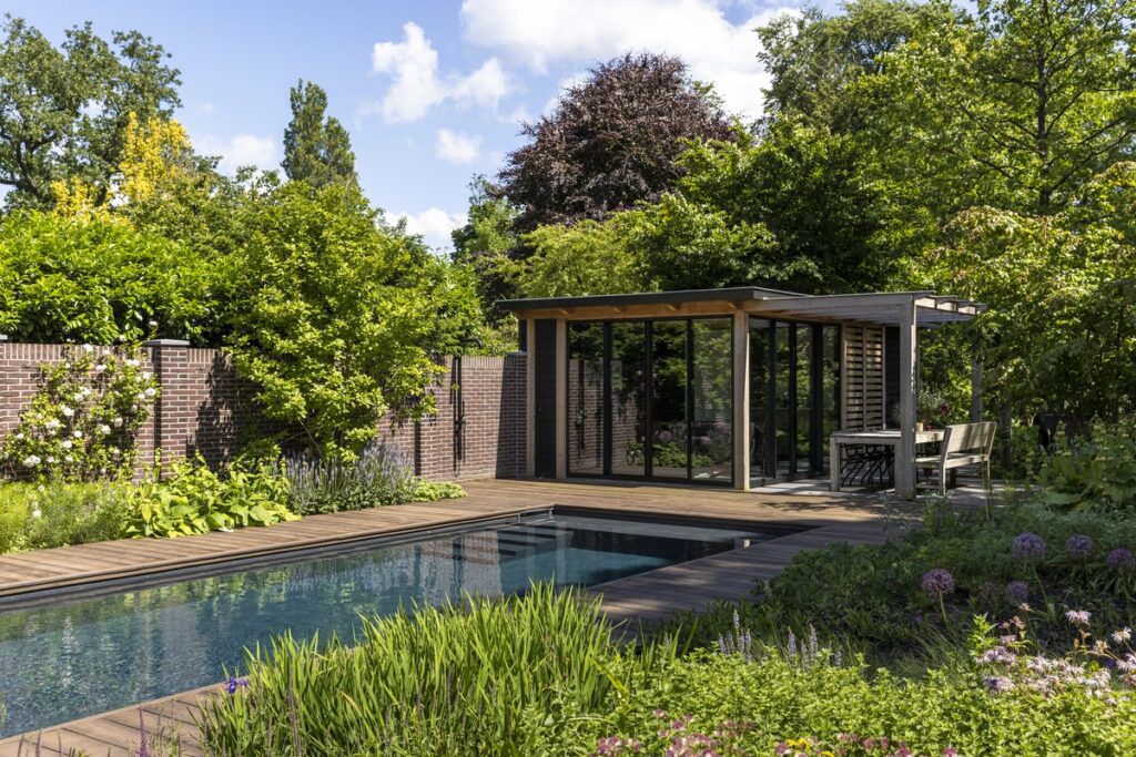A flowering to mixed woodland garden by Piet Oudolf