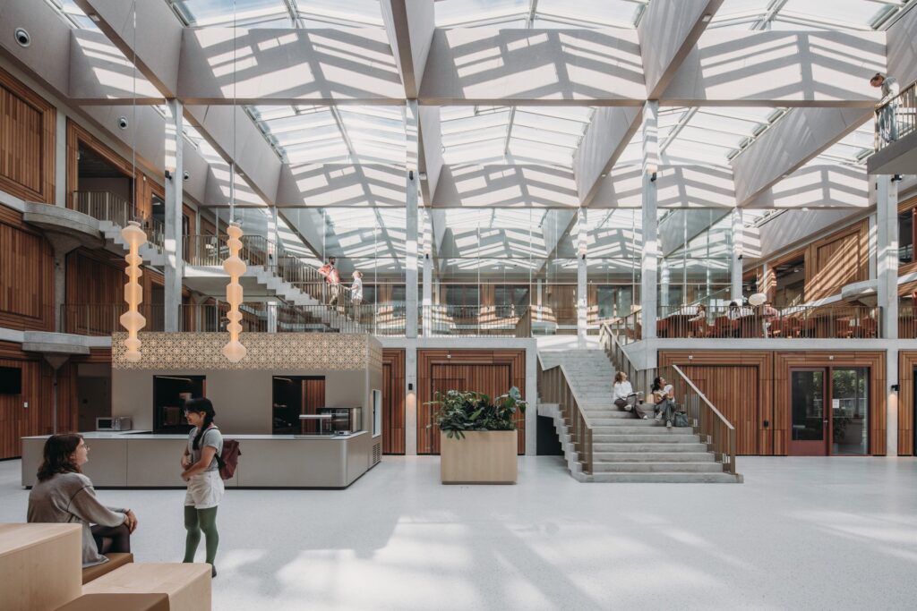 View of the Herta Mohr Building atrium with seating islands and natural light
