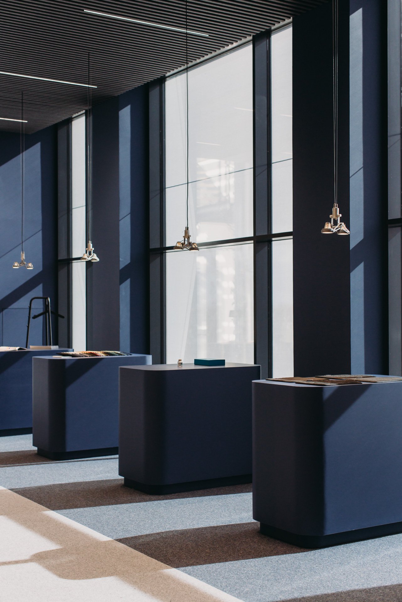 Interior view of VEBE's facility showcasing large windows and open spaces