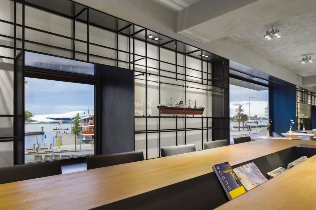 Coffee bar overlooking the IJ and ship models