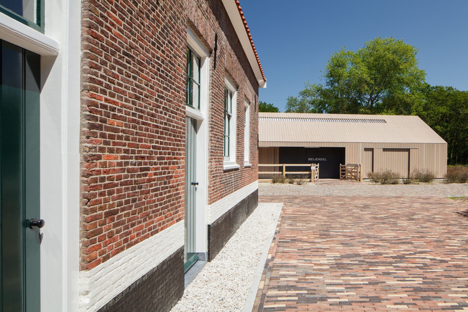 Historic barn in decay converts to visitor center as part of the transformation of a farm ensemble