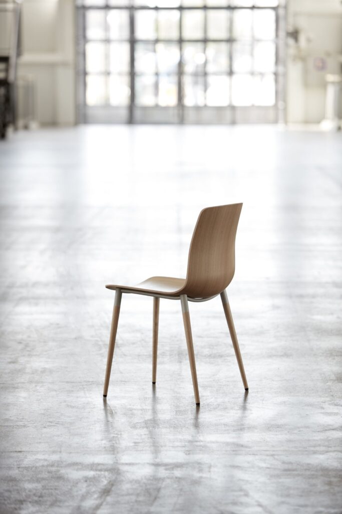 A chair from the Pi Collection with a focus on simplicity and comfort