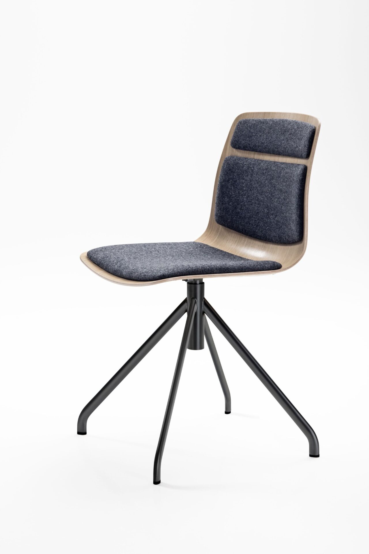 A chair from the Pi Collection with unseen seating comfort