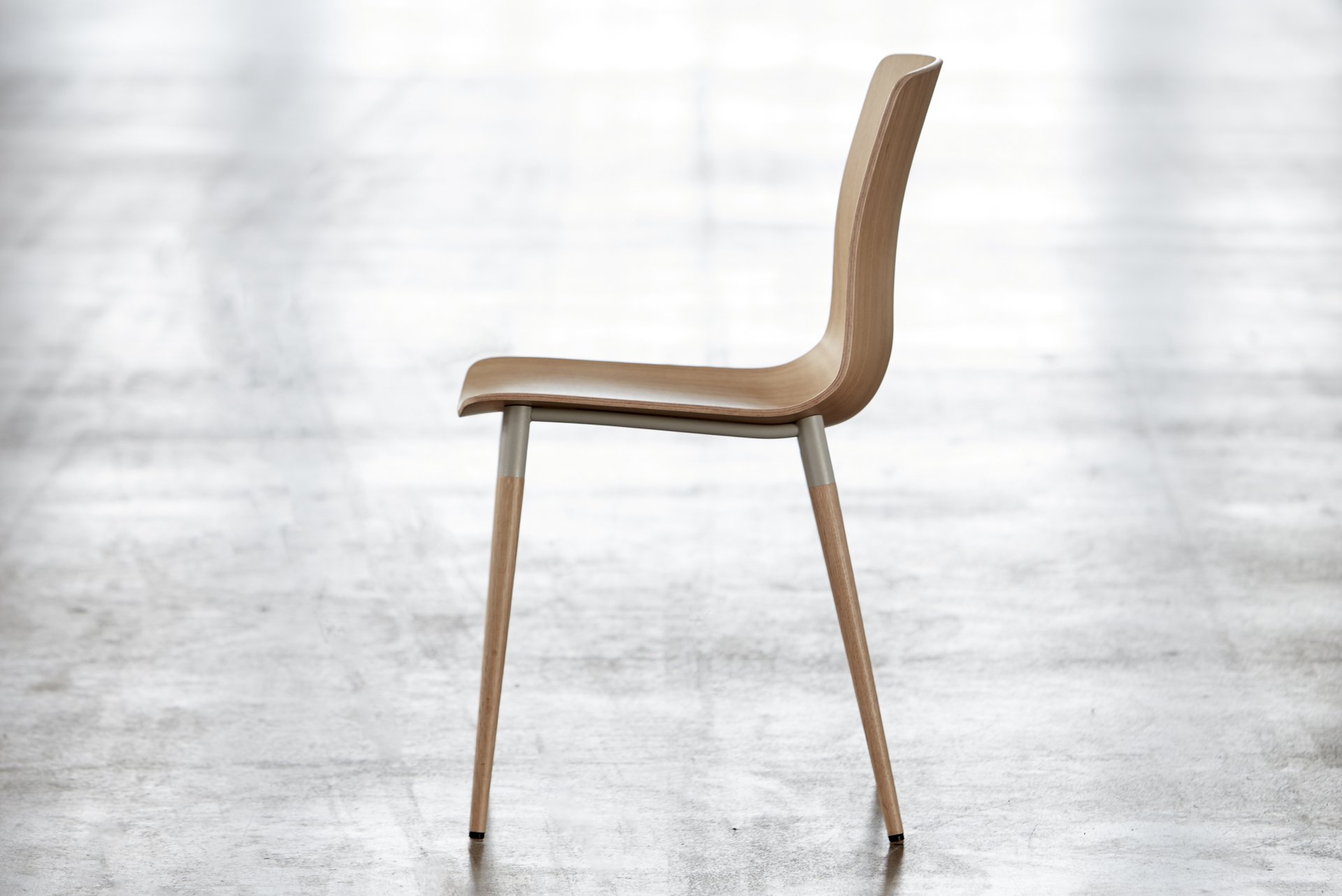 A chair from the Pi Collection in a modern setting