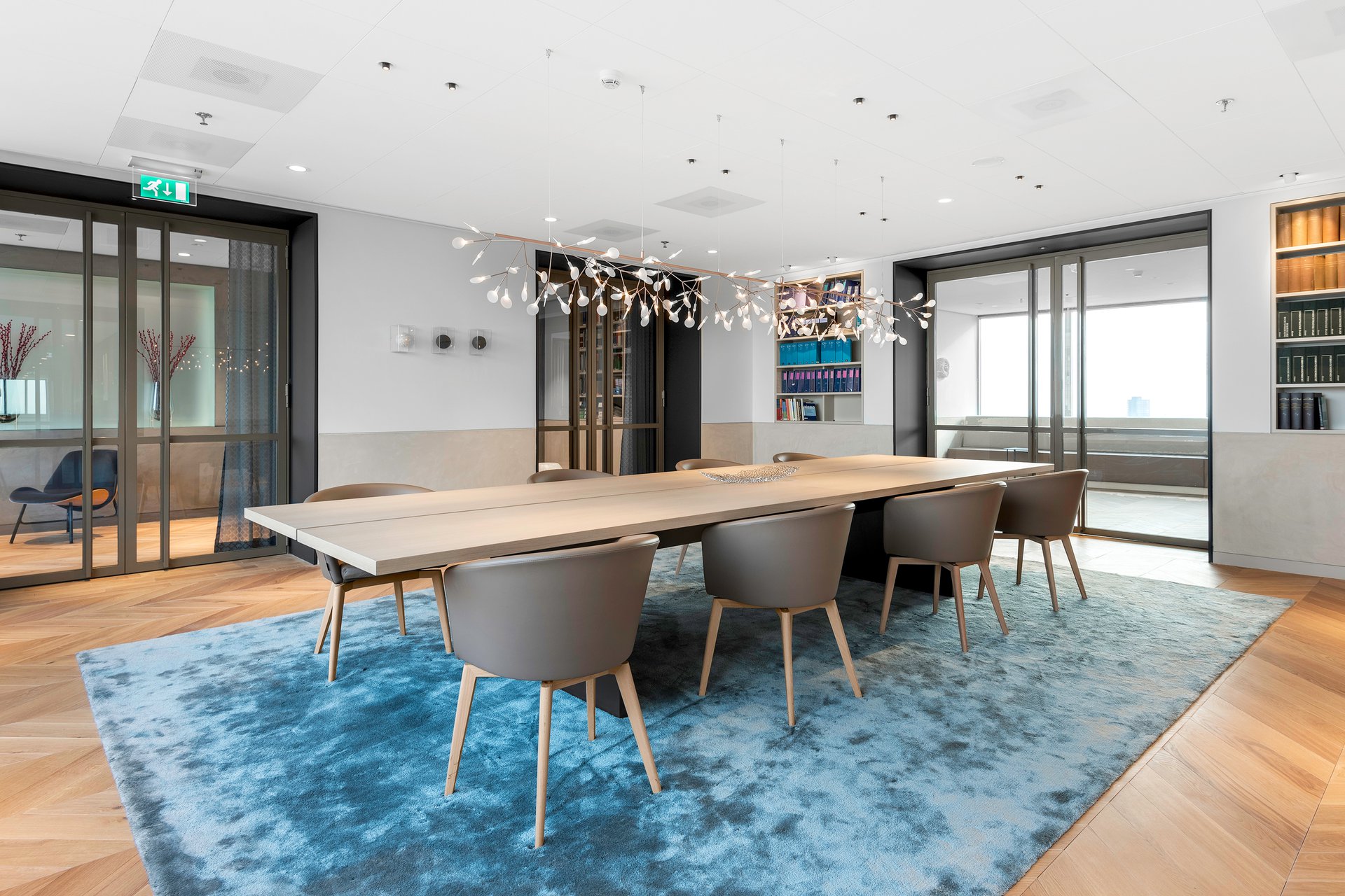 Modern office with herringbone wooden floor