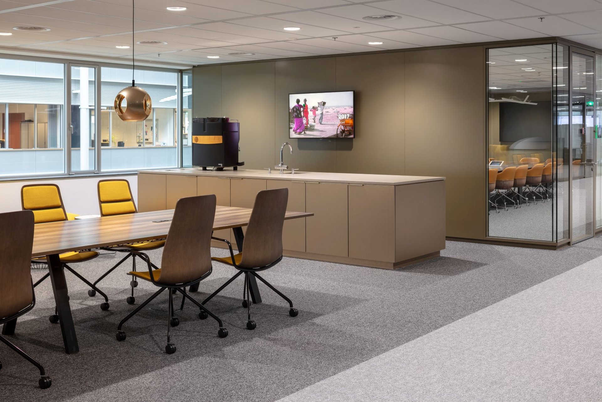 Office area with modern lighting fixtures