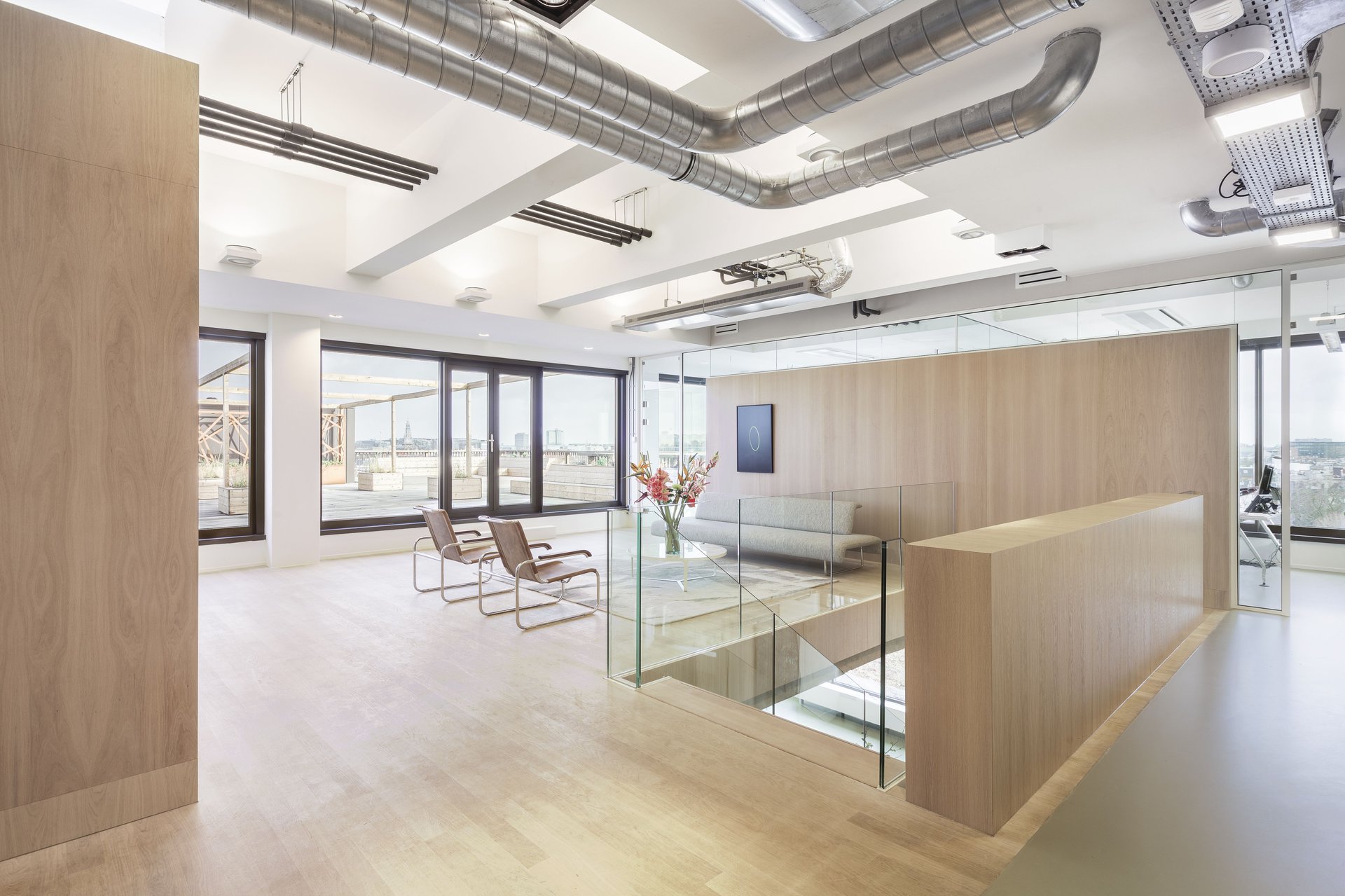 Office interior with natural light and modern design.