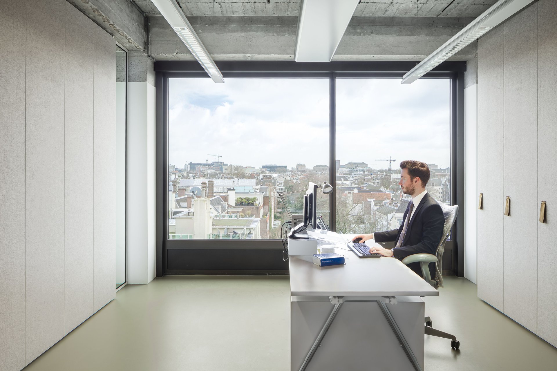 Interior view with a unique staircase and open spaces.
