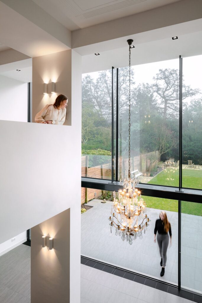 Double story extension with glazed facade