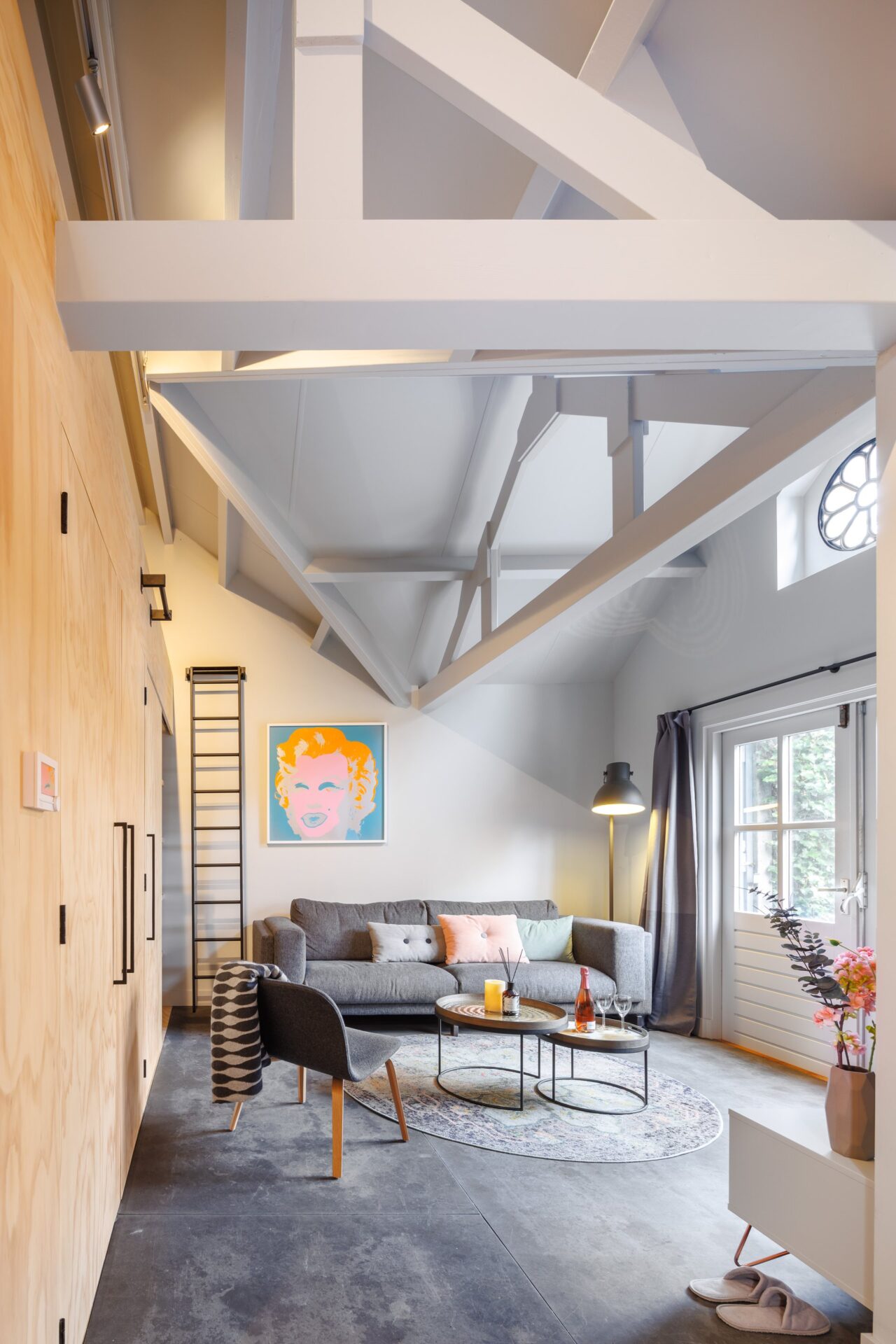 A not so tiny 'Tiny House' with pitched roof and exposed structure